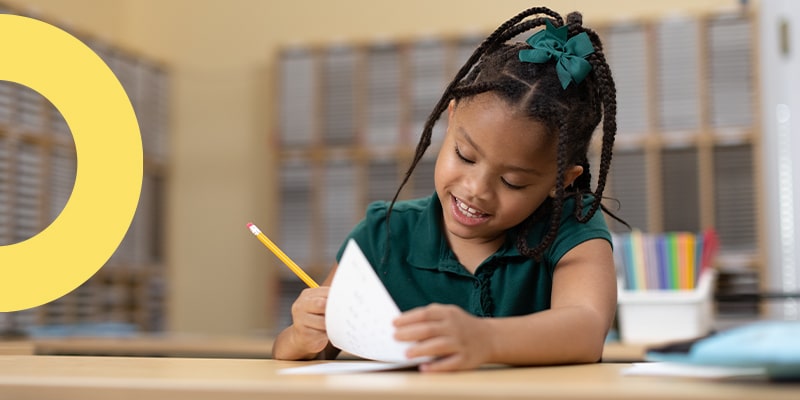 Young girl doing homework at a learning center